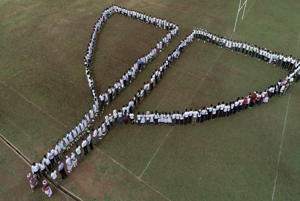 Aerial view of Sri Lanka College of Pulmonologists members and medical students forming a symbolic pattern at a community respiratory-health awareness event